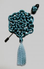 Broche bleue